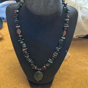 stone necklace.